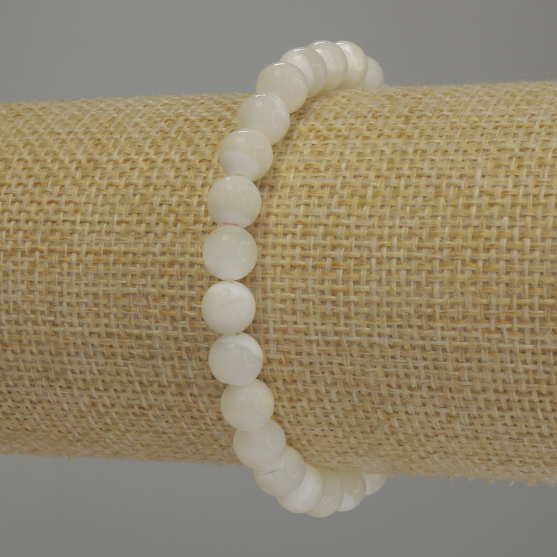 Perlmuttarmband, glatte Kugeln, Ø ca. 7 mm, Länge ca. 18 cm, elastisches Band