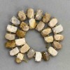 Versteinertes Korallen-Perlen, facettierte 16–19 × 11–12 mm, 4 mm Glasperlen, Länge ca. 40 cm, auf einer Schnur