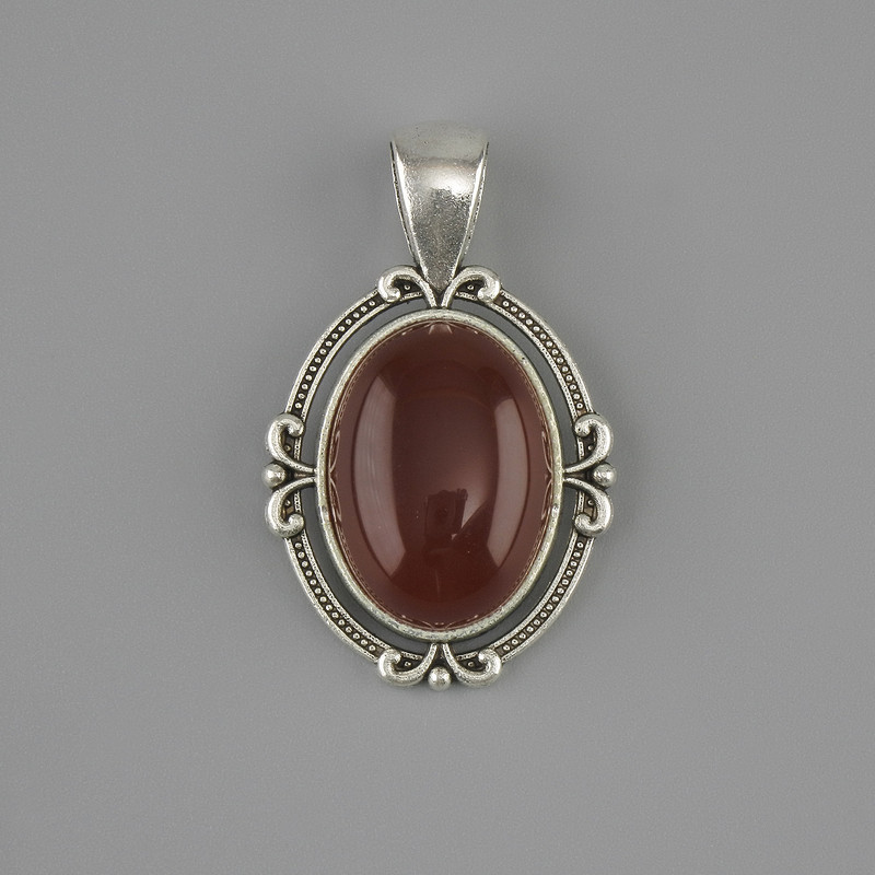 Anhänger Karneol 34 × 21 mm ± silberfarbenes Metall