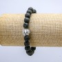 Elastisches Lavasteinarmband, Durchmesser ca. 8 mm, mit Löwenanhänger