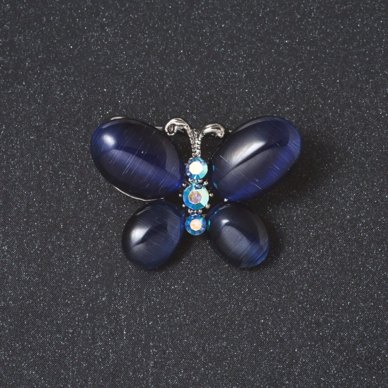 Brosche «Schmetterling» mit blauem Katzenauge und silberfarbenem Metall, 2 cm